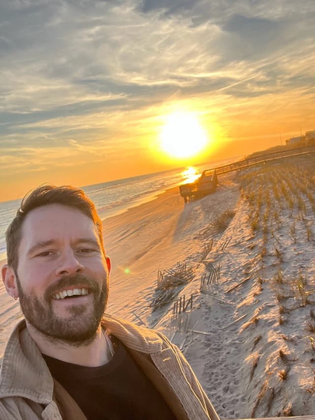 Stephen at the beach during sunset